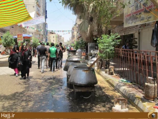 تصاوير توزيع گسترده نذري در كربلا به مناسبت نيمه شعبان