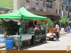 تصاوير توزيع گسترده نذري در كربلا به مناسبت نيمه شعبان
