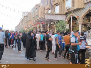 تصاوير توزيع گسترده نذري در كربلا به مناسبت نيمه شعبان