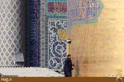 تصاوير شستشوي گنبد حرم مطهر امام رضا(ع)