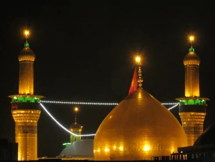 بازگشت پرچم سرخ بر فراز گنبد سيدالشهدا/ تصاوير