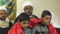 تكريم آستان قدس حسيني از خانواده شهداي اهل سنت