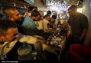 گزارش تصویری از سفره‌های افطار در نجف اشرف