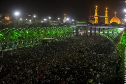 بين الحرمين ، هنگام تعويض پرچم عزاي حسين