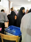 حضور زائران ايراني در صندوق راي در كربلاي معلي +تصاوير