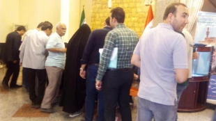 گزارش تصويري از حضور زائران ايراني در صندوق هاي راي در كاظمين