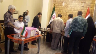 گزارش تصويري از حضور زائران ايراني در صندوق هاي راي در كاظمين