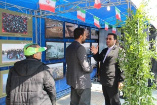 برپايي غرفه فرهنگي سازمان حج و بعثه مقام معظم رهبري درمسير راهپيمايي 22 بهمن