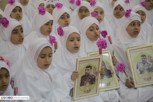 برگزاري جشن تكليف كودكان يتيم در مدرسه وابسته به آستان قدس حسيني