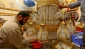 تعویض لوستر حرم امام علی (ع)