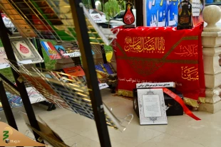 روایتگری مصور عاشورا با چهار زبان در قرارگاه اربعین استان قم 17