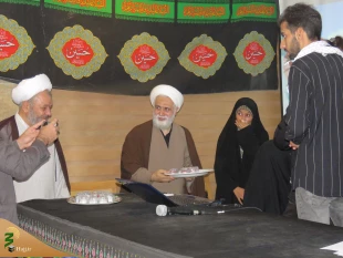حجت الاسلام والمسلمین محمدیان : قرآن و اهل بیت دو بالی که انسان را به کمالمی رسانند. 13
