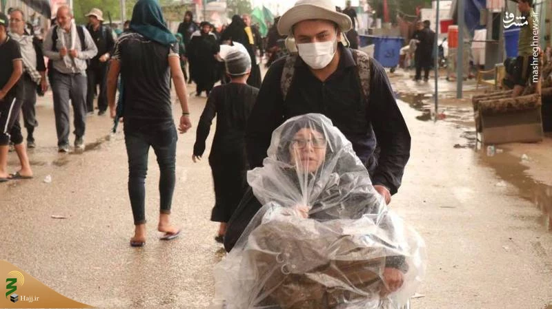 الحسین یجمعنا؛
تصویری از پیاده‌روی اربعین در باران
