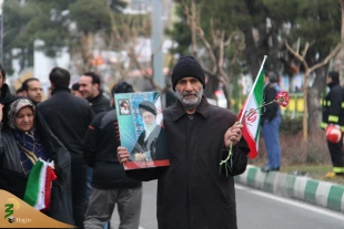 در چهلمین سالگرد پیروزی انقلاب اسلامی ایران صورت پذیرفت:

استقبال راه پیمایان 22 بهمن از نمایشگاه دستاوردهای حوزه حج و زیارت - گزارش تصویری 19