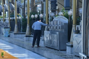 خدمت رسانی خادمان در بین الحرمین کربلا + تصاویر 18
