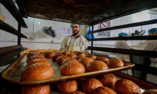 پخت و توزیع افطاری در آشپزخانه مهانسرای آستان علوی 12