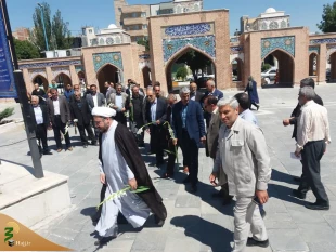 حضور مسئول دفتر نمایندگی بعثه مقام معظم رهبری در استان اردبیل در مزار شهدای فاجعه منا به مناسبت هفته حج 8