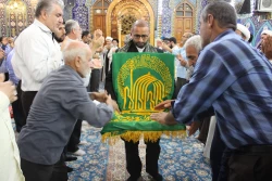 با استقبال پرشور زائران حسینی؛
پرچم بارگاه منور رضوی به کربلا رسید 4