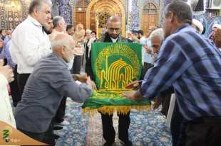 با استقبال پرشور زائران حسینی؛
پرچم بارگاه منور رضوی به کربلا رسید 4