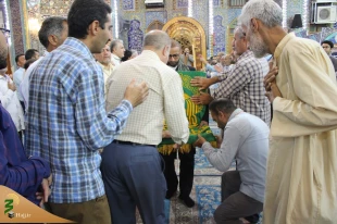 با استقبال پرشور زائران حسینی؛
پرچم بارگاه منور رضوی به کربلا رسید 6