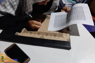 همدلی بین‌المللی زائران برای کتابت قرآن اربعین