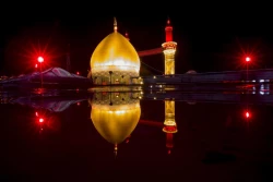 برافراشته شدن پرچم سرخ بر فراز مرقد مطهر حرمین در کربلای معلا 6