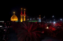 برافراشته شدن پرچم سرخ بر فراز مرقد مطهر حرمین در کربلای معلا 9