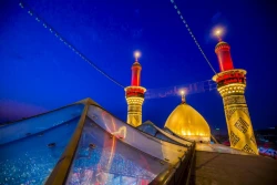 برافراشته شدن پرچم سرخ بر فراز مرقد مطهر حرمین در کربلای معلا 10