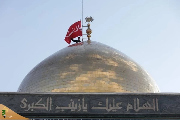 تعویض پرچم گنبد حرم حضرت زینب(س) 6