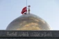 تعویض پرچم گنبد حرم حضرت زینب(س) 6