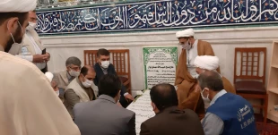 همزمان با هفته حج مراسم غباروبی مزار شهدا در بجنورد برگزار شد  2