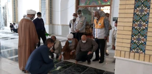 همزمان با هفته حج مراسم غباروبی مزار شهدا در بجنورد برگزار شد  7