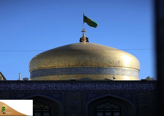 تعویض پرچم گنبد حرم امام رضا(ع) 2