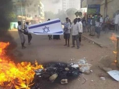 پرچم رژیم صهیونیستی در سودان به آتش کشیده شد+عکس

 2
