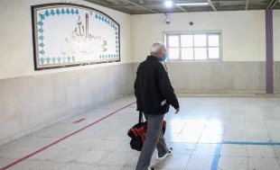 عکس/ آزادی زندانی با هزینه سفر اربعین 3