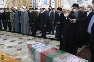 طواف پیکر شهید فخری‌زاده در حرم حضرت معصومه(س)/ اقامه نماز توسط آیت الله نوری همدانی 4
