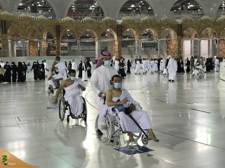 تصاویر زائران با ویلچر در مسجدالحرام 7