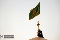 تعویض پرچم گنبد حرم مطهر رضوی همزمان با سوم ربیع الاول
 14