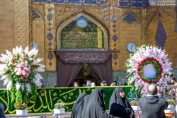پرچم «یا سیدة نساء العالمین» بر فراز گنبد حرم امام علی(ع) 3