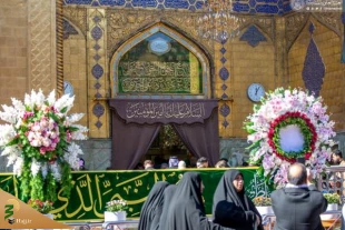 پرچم «یا سیدة نساء العالمین» بر فراز گنبد حرم امام علی(ع) 3