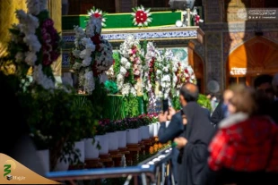 پرچم «یا سیدة نساء العالمین» بر فراز گنبد حرم امام علی(ع) 5