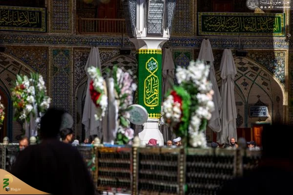 پرچم «یا سیدة نساء العالمین» بر فراز گنبد حرم امام علی(ع) 6