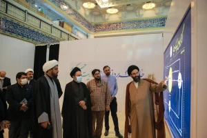 Head of the Iranian pilgrims visits Quran exhibition