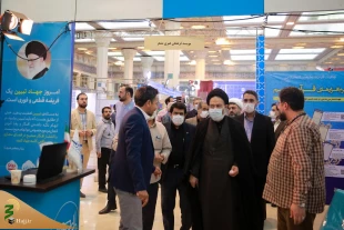 Head of the Iranian pilgrims visits Quran exhibition 11