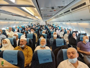 به غنیمت شمردن آخرین فرصت همکلامی با زائران بیت الله الحرام در پرواز بازگشت به میهن 7