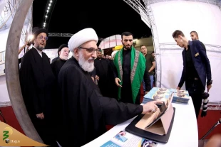 برپایی سومین نمایشگاه قرآنی در مسیر پیاده‌روی اربعین 5