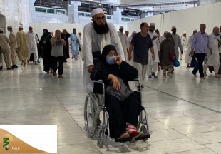 طواف خانه خدا با ویلچر + تصاویر 6