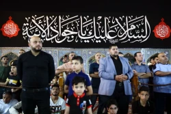 اهتزاز پرچم عزای گنبد بارگاه منور رضوی در کاظمین 15