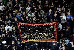 اهتزاز پرچم عزای گنبد بارگاه منور رضوی در کاظمین 5
