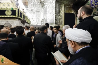 اهتزاز پرچم عزای گنبد بارگاه منور رضوی در کاظمین 7